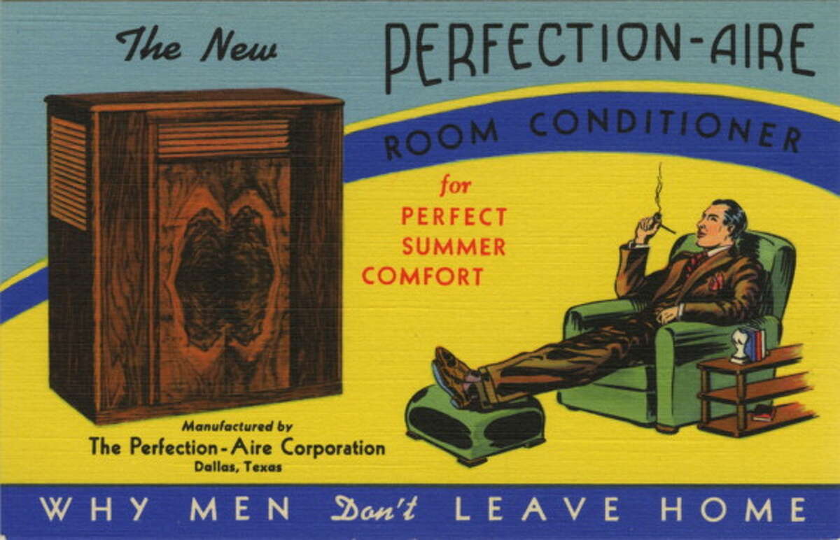 Vintage postcard view of a room air conditioner with a man in chair, wearing a suit, smoking a pipe, with his feet on an ottoman.